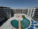 2 bedroom apartment with a pool view in the compound with a private beach
